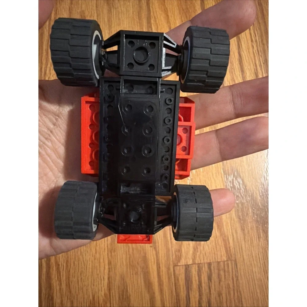 Red Lego Ferrari Bridgestone Shell Four-Wheel Car